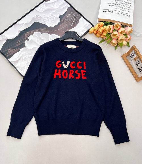 Gucci Red knit sweater with cartoon patterns and logo