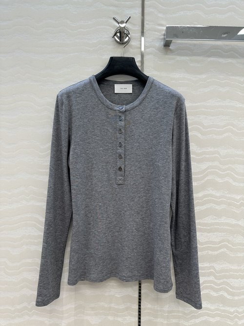 The Row Exclusive Row-style Slimming Henley Neck Wool Blend Top