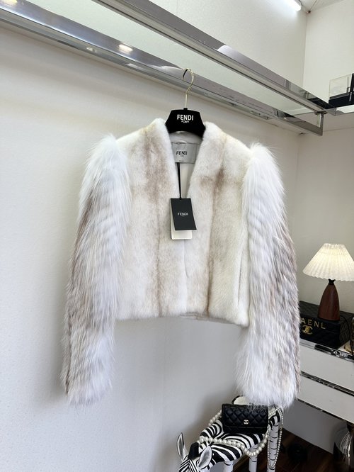 Fendi Luxurious Imported Mink Coat Adorned with Silver Fox Sleeve Inserts