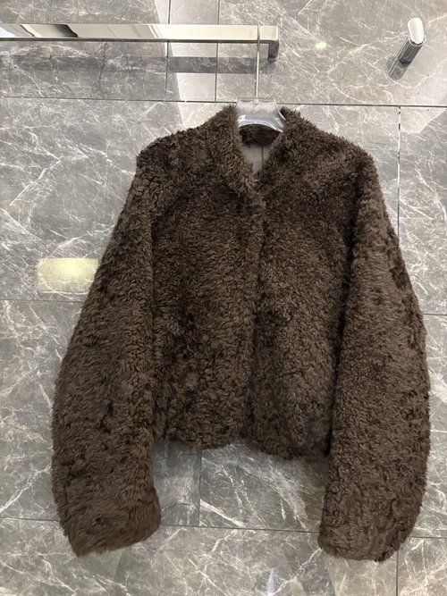 The Row Exclusive Lightweight Lamb Fur Coat with V - neck and Classic H - shape