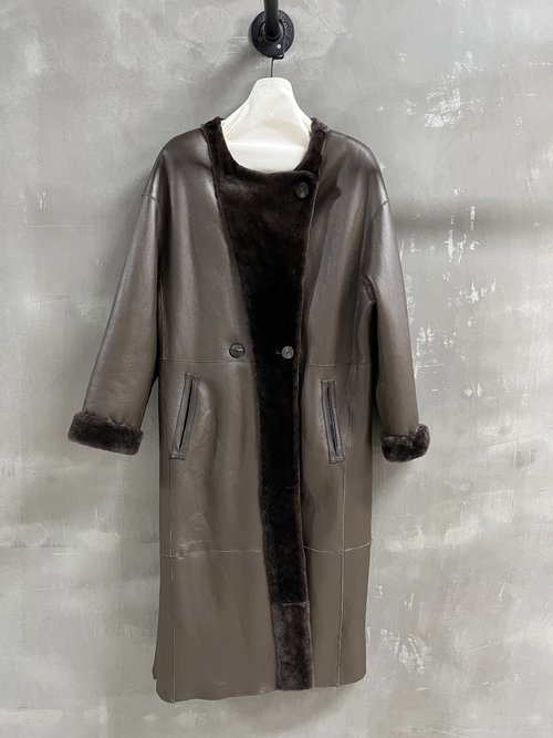 Miu Miu Elegant and Functional Fur and Leather Blend Garments